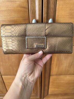 Calvin Klein Metallic Bronze Snake-Embossed Clutch Wallet